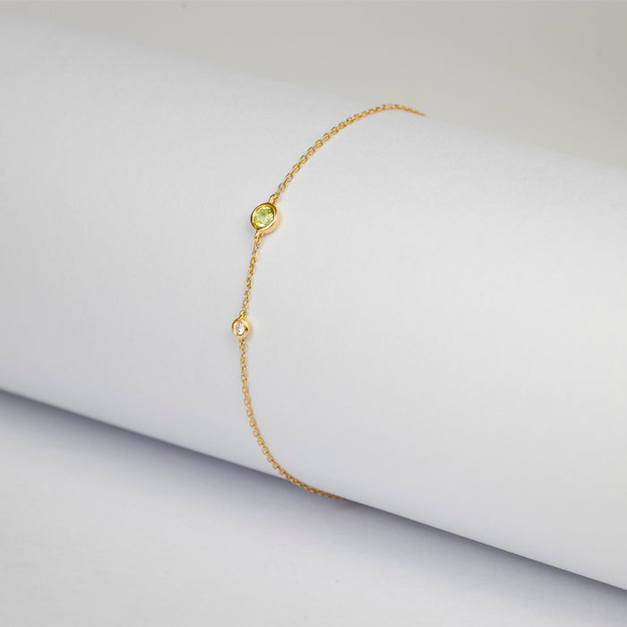 Pulsera Birthstone Premium con Peridoto y Diamante en oro amarillo 14 Kt (Agosto)