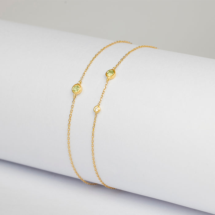 Pulsera Birthstone Premium con Peridoto y Diamante en oro amarillo 14 Kt (Agosto)